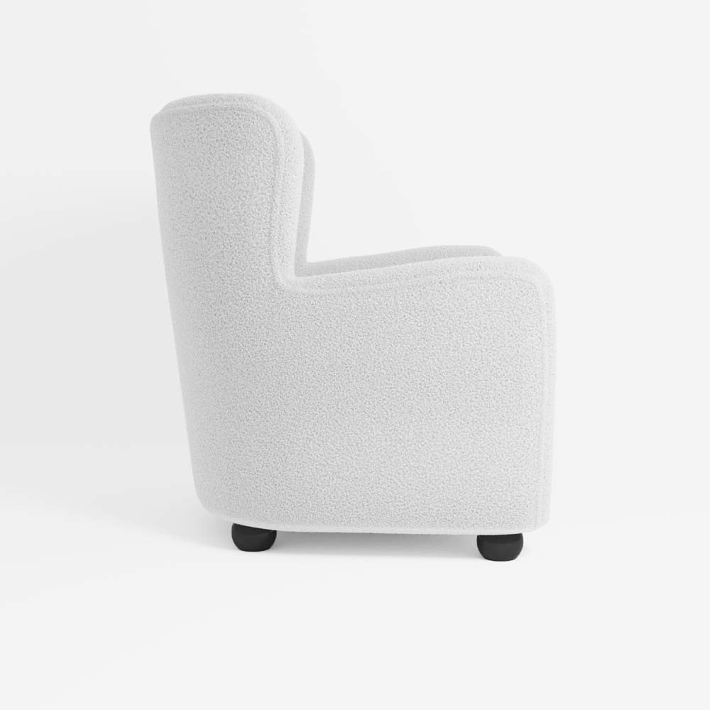 Fauteuil blanc effet laine bouclée